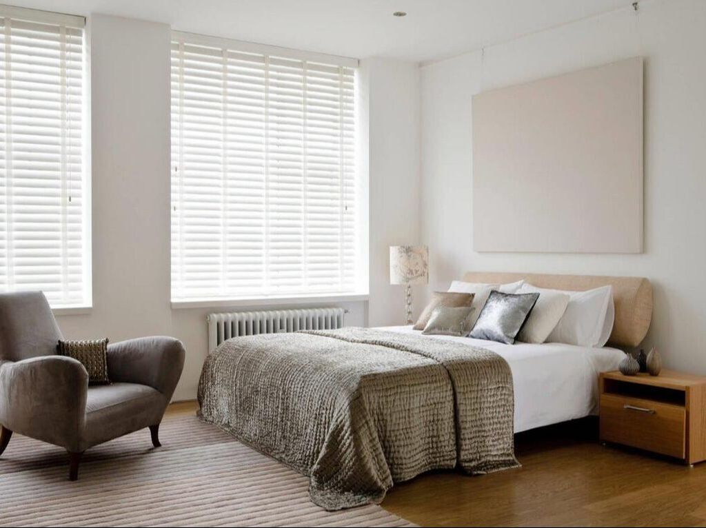 Modern Bedroom with white Venetian blinds